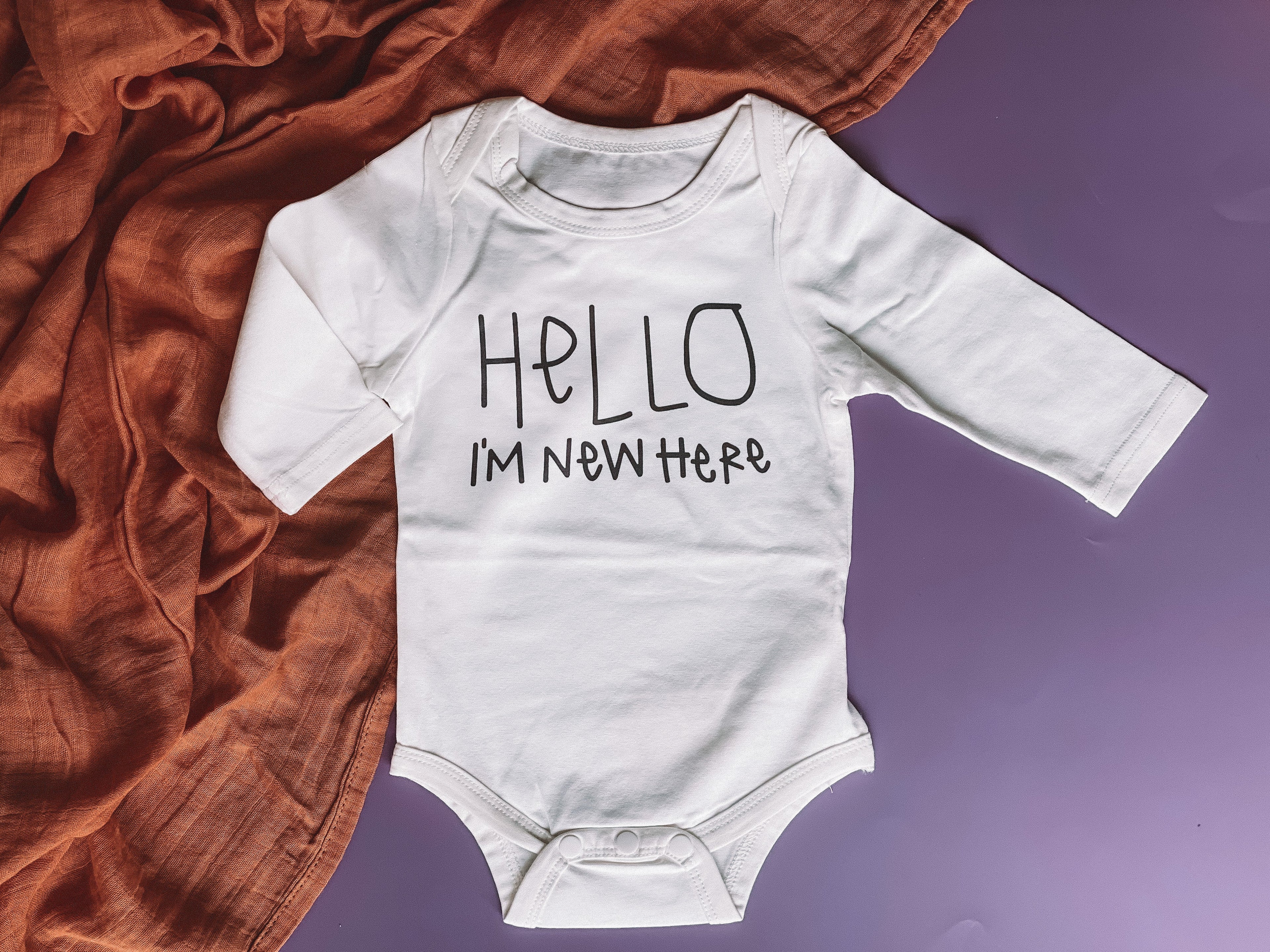 Hello I’m new here romper - Long Sleeve